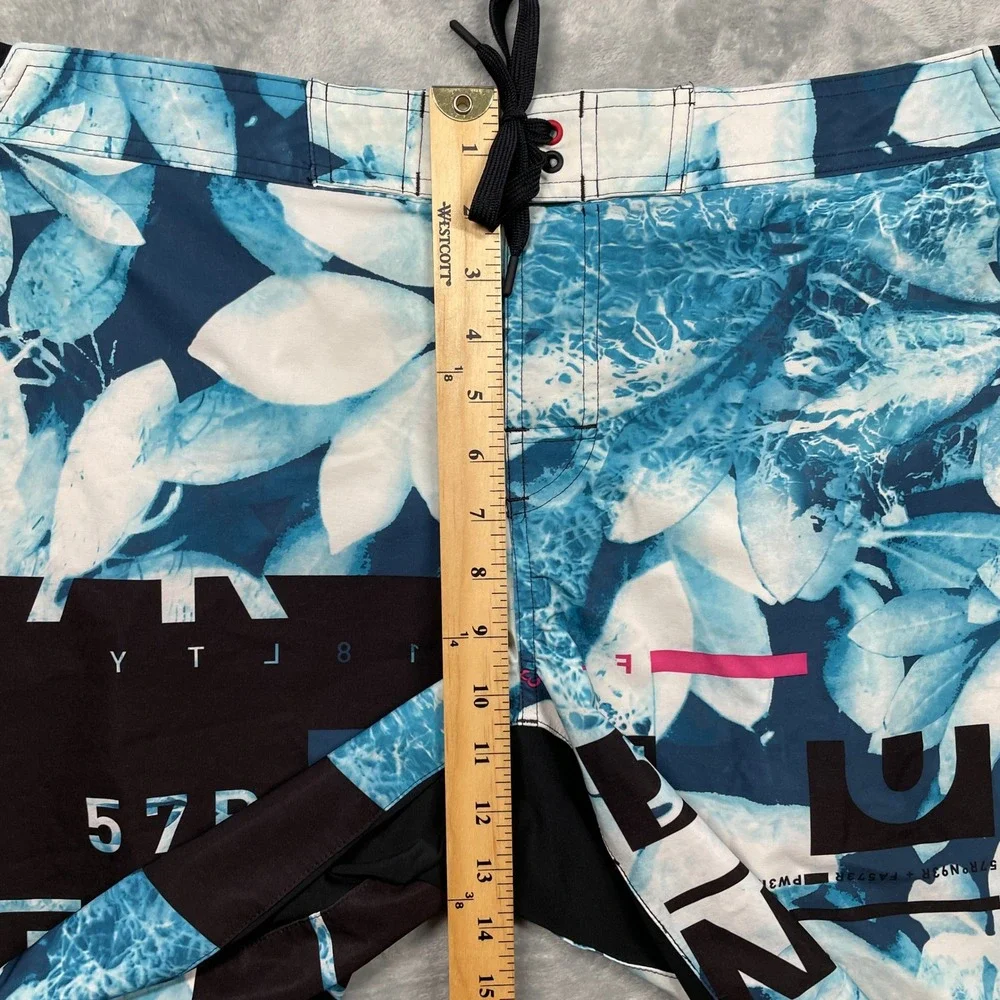 Reebok‎ Board Shorts Mens Large Blue White Floral Graphic Swim Trunks
